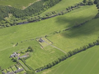 Oblique aerial view of Cranshaws Parish Church, taken from the WNW.