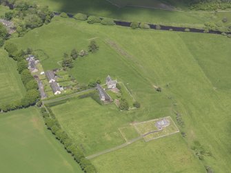 Oblique aerial view of Cranshaws Parish Church, taken from the SSW.