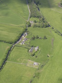 General oblique aerial view of Cranshaws Parish Church, taken from the SE.