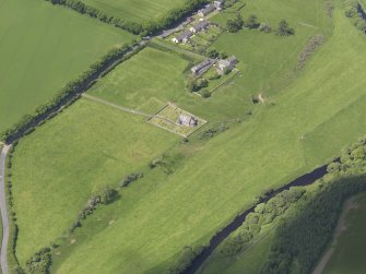 Oblique aerial view of Cranshaws Parish Church, taken from the SE.