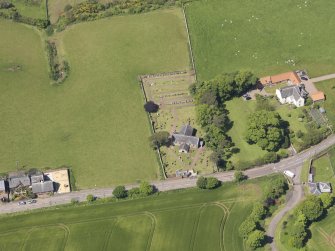 Oblique aerial view of Spott Parish Church, taken from the SSE.