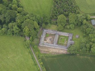Oblique aerial view of Wedderburn Castle stable block, taken from the NNW.