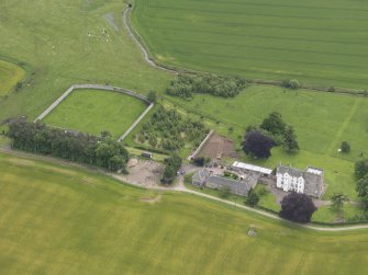 Oblique aerial view of Nisbet House and walled garden, taken from the NW.