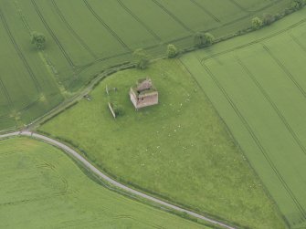 Oblique aerial view of Cessford Castle, taken from the NW.