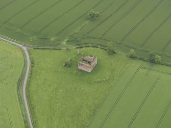 Oblique aerial view of Cessford Castle, taken from the W.