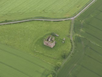 Oblique aerial view of Cessford Castle, taken from the SE.