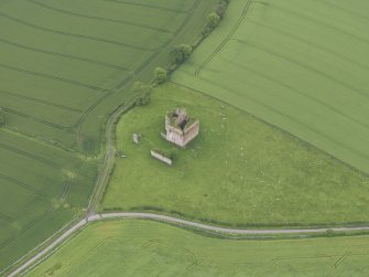 Oblique aerial view of Cessford Castle, taken from the NNW.