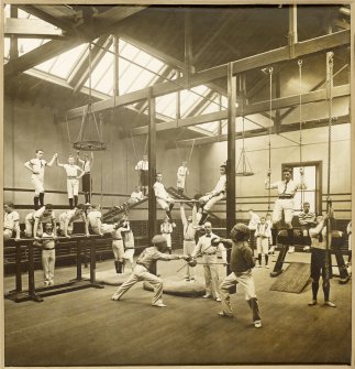 Interior view of George Watson's College for Boys, Edinburgh showing gymnasium. 
Titled: 'George Watson's College for Boys. Edinburgh Merchant Company Schools No1'.