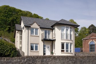 General view of modern detached house at 15A High Road, Port Bannatyne, Bute, from E