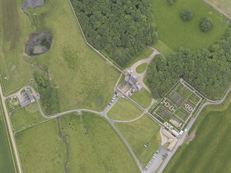 Oblique aerial view centred on Castle of Mey, looking SE.