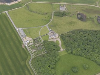 Oblique aerial view centred on Castle of Mey, looking NE.