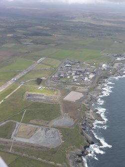 General oblique aerial view of Dounreay Nuclear Development Establishment, looking W.