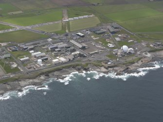 Oblique aerial view of Dounreay Nuclear Development Establishment, looking S.