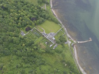 Oblique aerial view centred on Tongue House, looking SW.