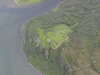 Oblique aerial view centred on Caisteal Bharraich, looking ESE.