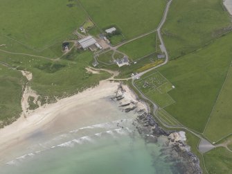 Oblique aerial view centred on Balnakeil House and Durness Parish Church, looking SE.