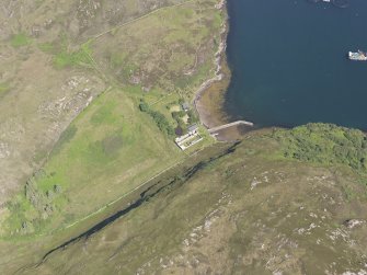 Oblique aerial view of the pier and buildings, Tanera Mor/Tannara Mor, looking N.