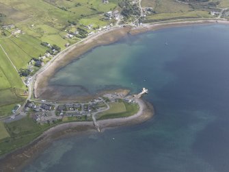 Oblique aerial view of Aultbea, centred on the pier, looking E.
