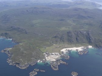 Oblique aerial view of Sanna and the Ardnamurchan volcano, looking E.