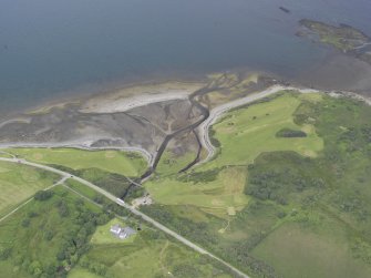 Oblique aerial view centred on Craignure Golf Club, looking NE.