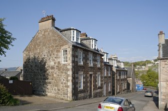 General view of 4, 6 and 8 Columshill Place, Rothesay, Bute, from SW