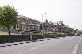 General view from NE showing group of semi-detached houses forming Royal Terrace at 45-54 Mount Stuart Road, Craigmore, Rothesay, Bute