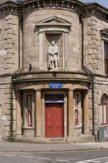 View of main entrance with statue above from south west