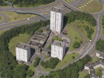 Oblique aerial view of Burns Road centred on the tower blocks, taken from the SSE.