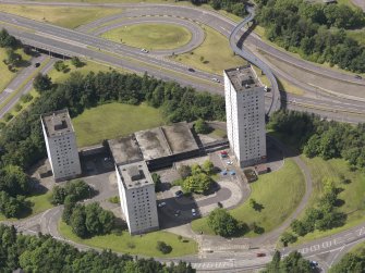 Oblique aerial view of Burns Road centred on the tower blocks, taken from the SE.