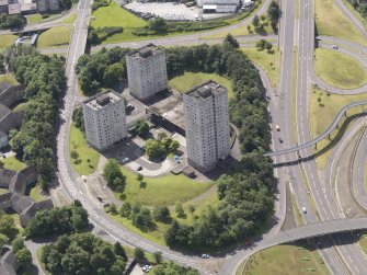 Oblique aerial view of Hume Road centred on the tower blocks, taken from the NE.