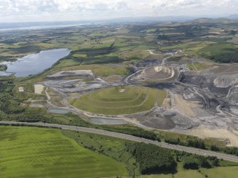 General oblique aerial view of the St Ninian's Open cast Mine centred on the Charles Jenks' landscaped feature, taken from the ENE.