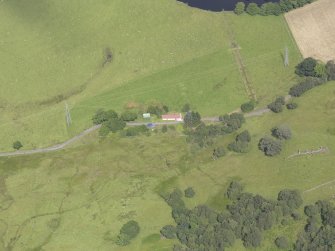 Oblique aerial view of Moirlanich Farmhouse, taken from the SSW.