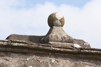 Lych gate, detail of ball finial with date stone (1705)