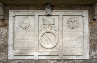 Detail of memorial on west gable of church