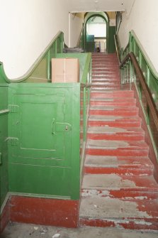 Interior. General view of staircase in side entrance.