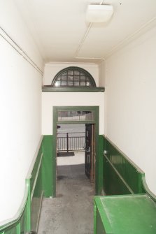 Interior. General view of side entrance staircase to entrance doorway.