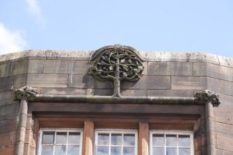 Exterior. Detail of tree motif.