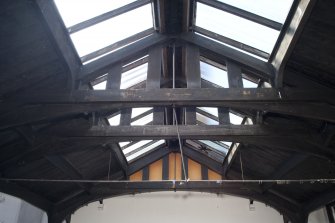 Interior. Detail of upper floor hall roof structure.