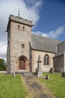 View of main door and tower from South East.