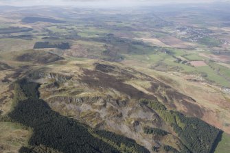 General oblique aerial view of Green Hill and Craig Rossie with Ben Effrey beyond, looking WSW.