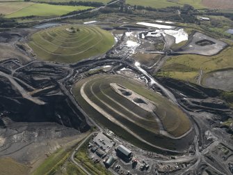 General oblique aerial view of St Ninian's Open Cast Mine, centred on the Sculptured Landscape by Charles Jenks, taken from the NW.