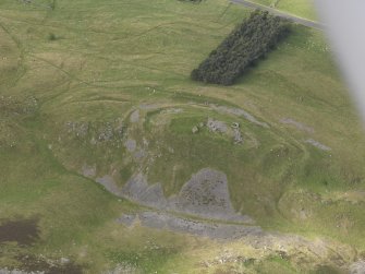 Oblique aerial view of Tinnis Castle, taken from the SE.