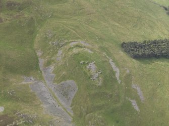 Oblique aerial view of Tinnis Castle, taken from the ENE.