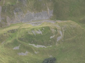 Oblique aerial view of Tinnis Castle, taken from the NW.