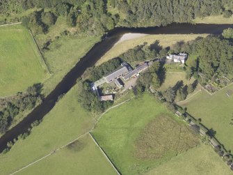Oblique aerial view of Drumelzier Castle, taken from the S.