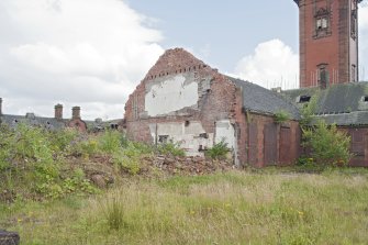 View of demolished gable of kitchen block from North West.