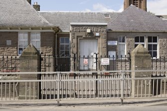 View of gate piers and railings.