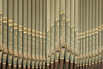 Detail of decorated organ pipes.