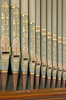 Detail of decorated organ pipes.