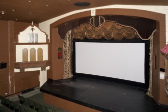 Auditorium. Stage and screen from balcony to north.